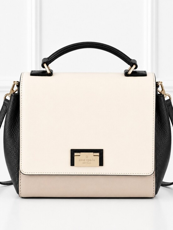 kate spade Handbags - Kate Spade Black and Cream Satchel